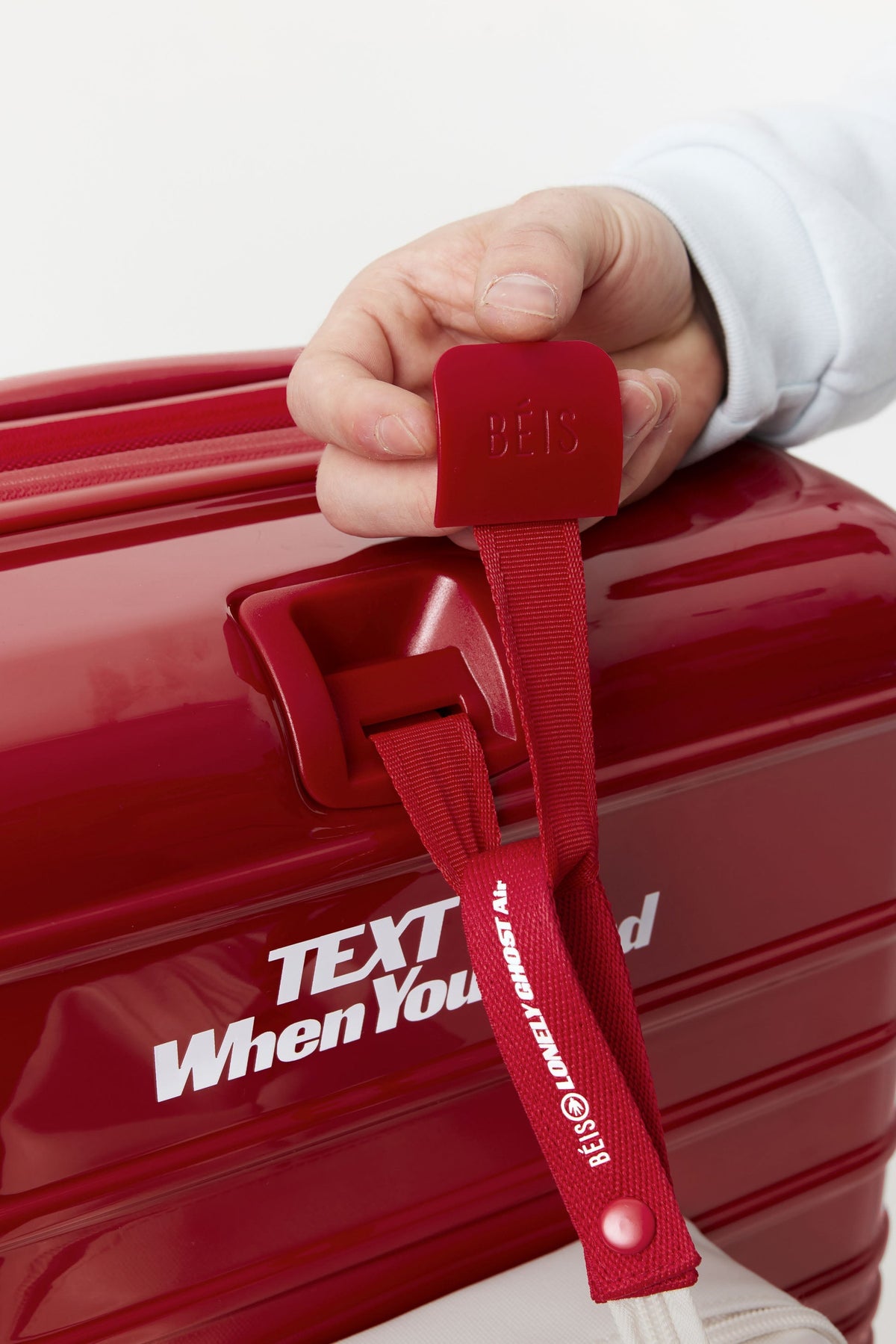 The Carry-On Roller in Text Me Red - Image 9