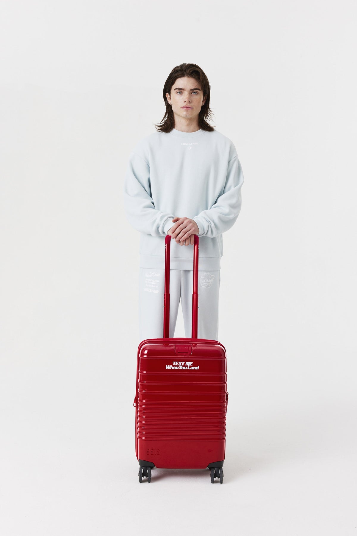 The Carry-On Roller in Text Me Red - Image 5