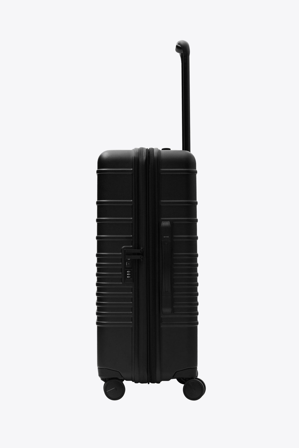 The Medium Check-In Roller in All Black - Image 6