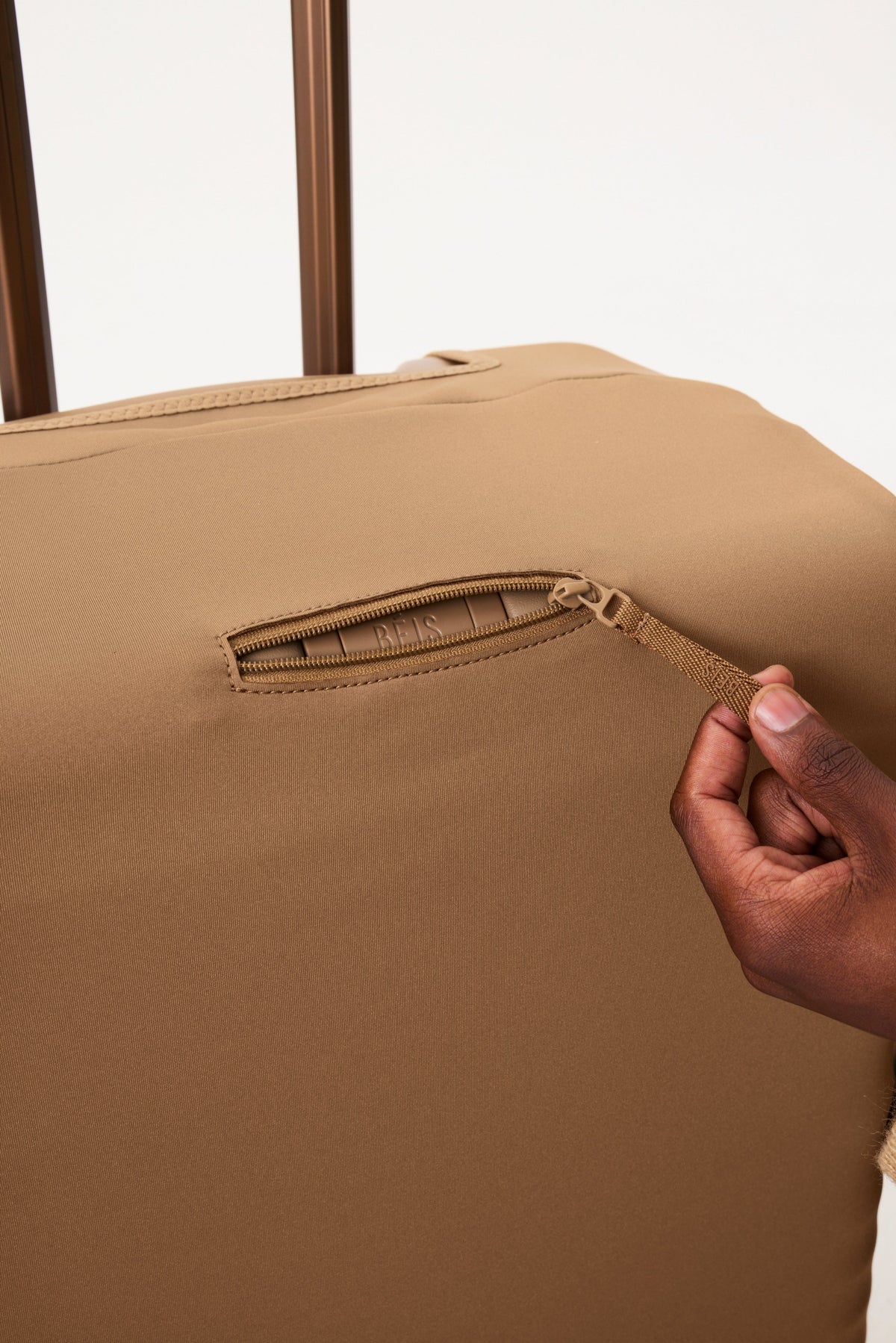 The Small Carry-On Luggage Cover in Camel - Image 4