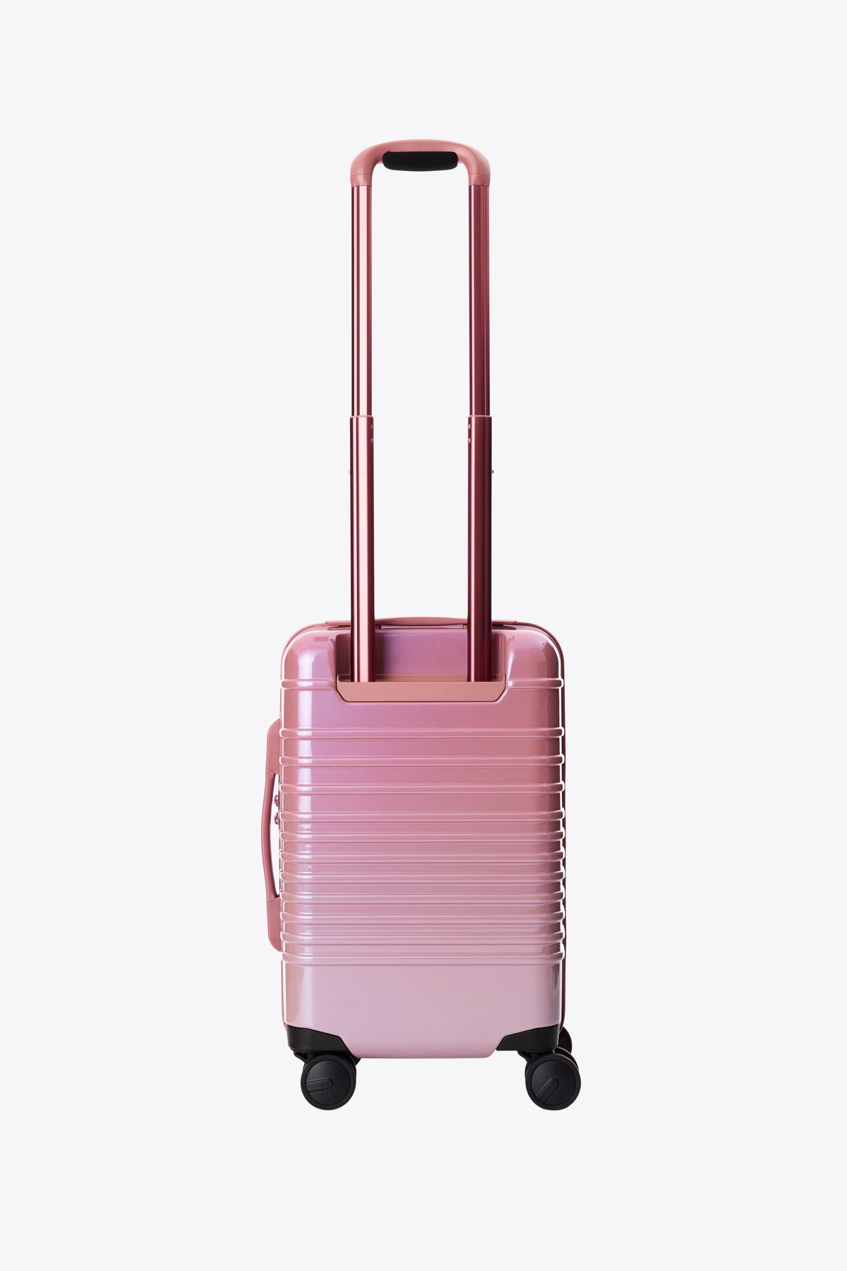 The Small Carry-On Roller in Wicked Pink - Image 3